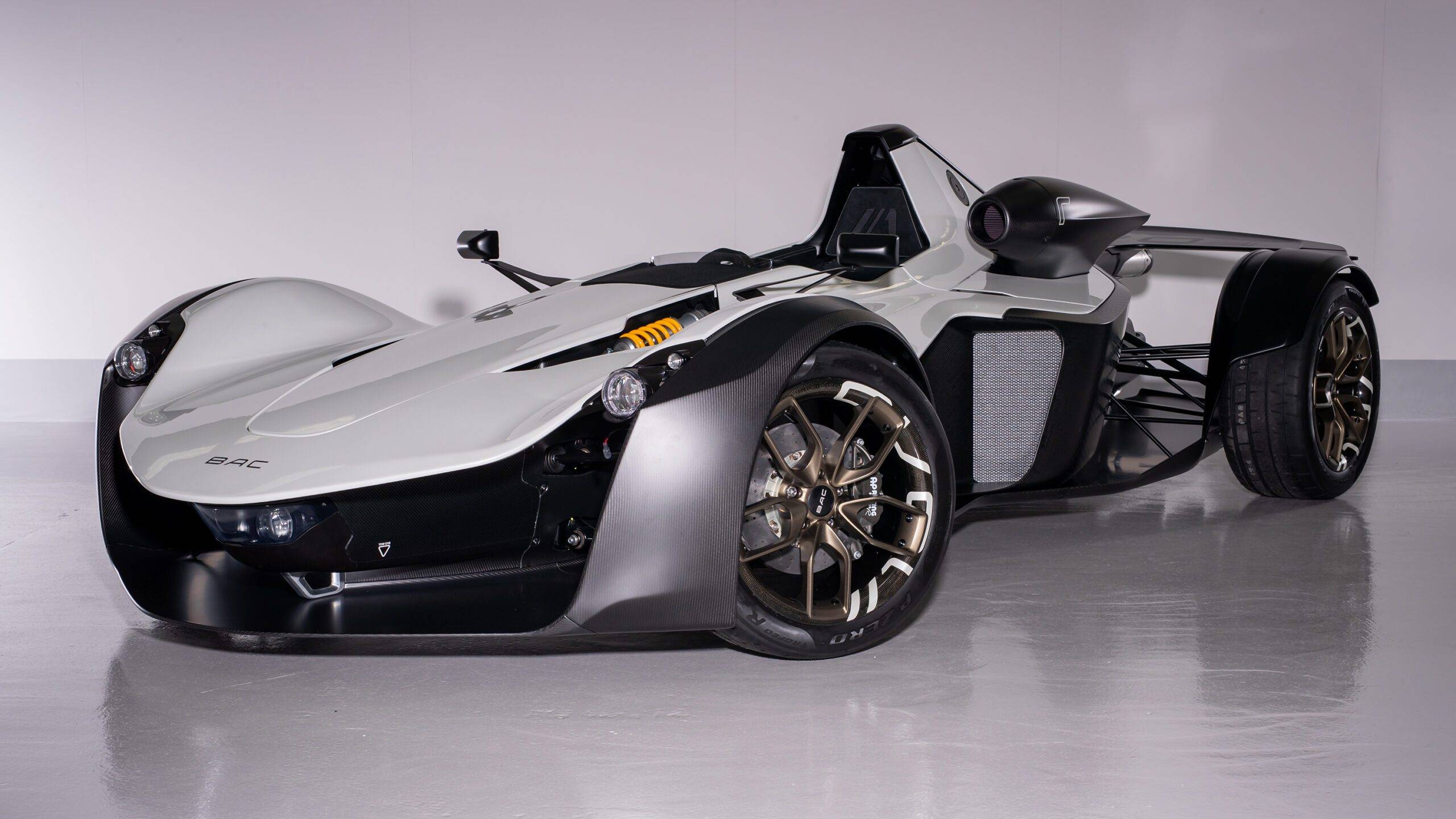The BAC Mono in grey with black accents, parked up.