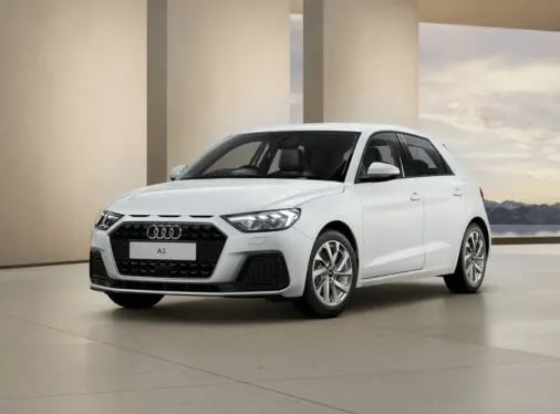 A white Audi A1 in a contemporary setting, with pillars behind and mountains in the background.