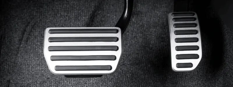 A close up of pedals in automatic car.