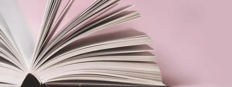 A book split open down the middle, with multiple pages on show.