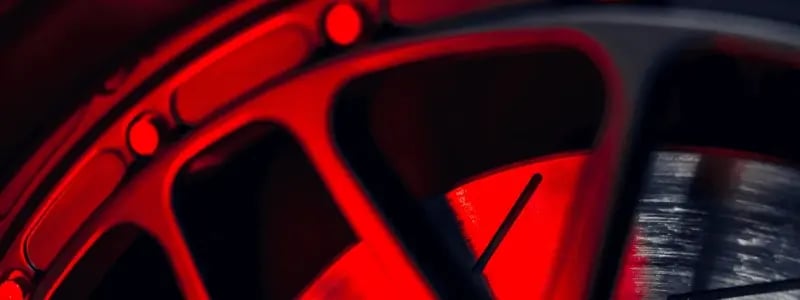 A close up of a car tyre with the brake system in shot.