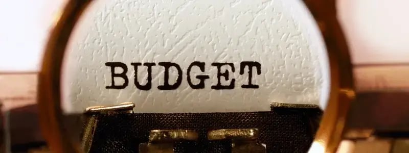 The word 'BUDGET' up close in a typewriter.