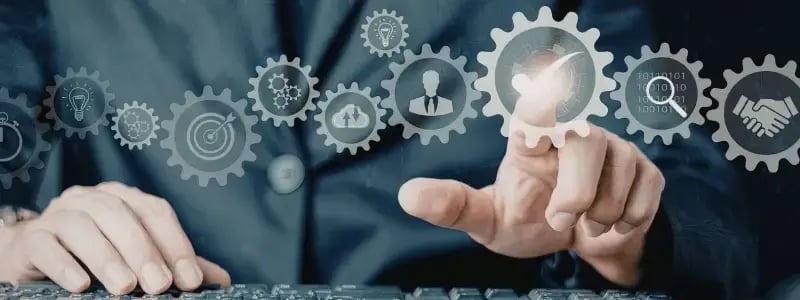 A person interacting with floating icons that represent workplace efficiency.