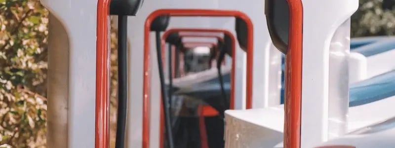 A close up of multiple electric car chargers in a line.