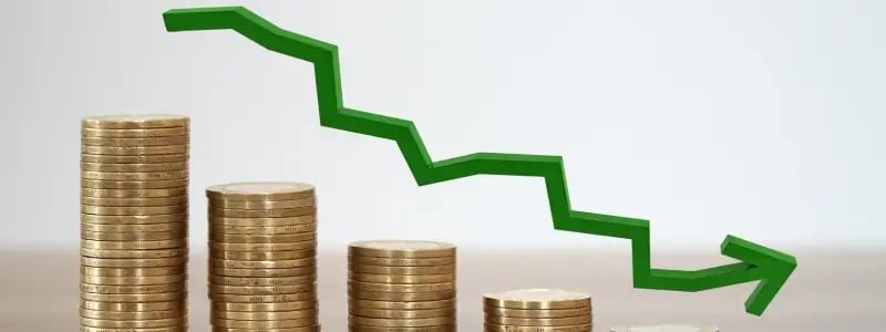 Stacks of coins decreasing in size from left to right, matched with a an arrow following the downward path. This symbolises money/value fall.