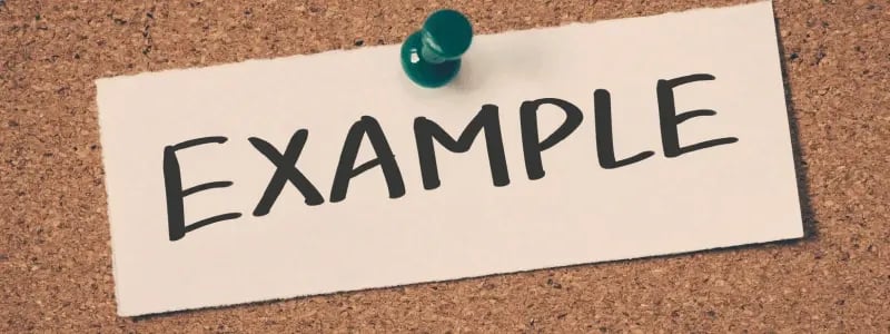 'EXAMPLE' on a piece of paper, pinned to a pinboard.