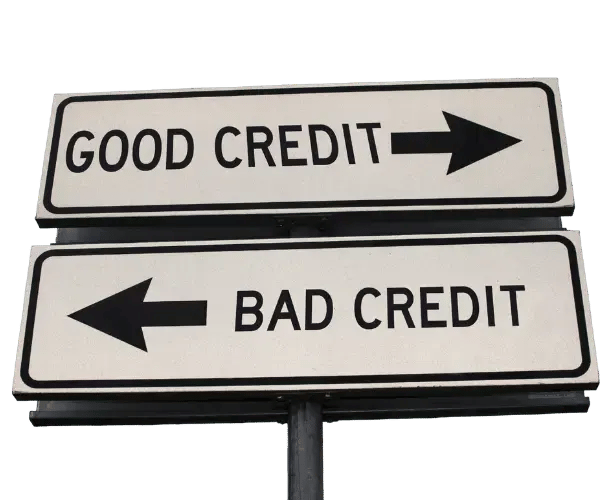 Two signs pointing in different directions. One with good credit and one with bad credit on, both pointing in different directions.