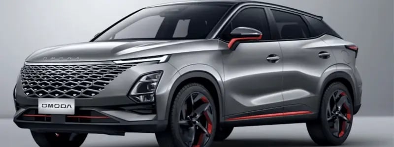 A grey Omoda parked side on against a grey background.