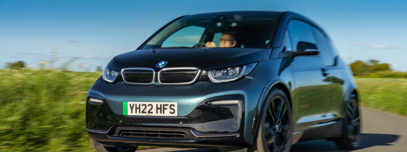 A BMW i3 on a road.
