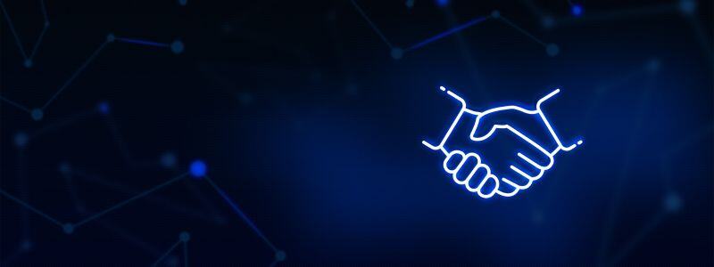 Two digital outlines of hands engaging in a handshake sat against a digital background.