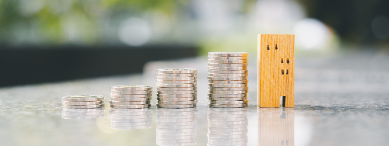 Stacks of coins ascending in size from left to right.