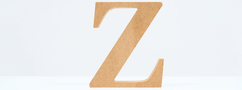 The letter 'Z' in wooden cork, against a white background.