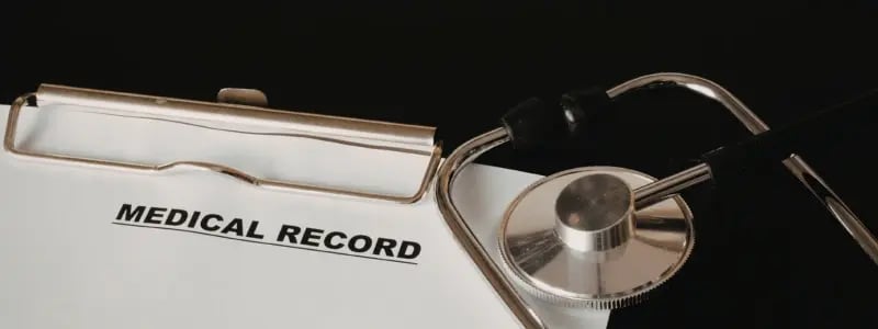 A white document showing a medical record, with a medical instrument next to it.