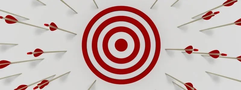 A circular target with red and white stripes, and darts dotted outside of the target, representing something being missed.