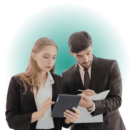 Two business people in discussion with a green glow in the background.