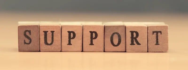 Letter blocks spelling out 'SUPPORT'.