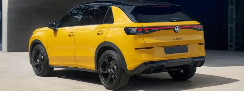 A view of the back of a yellow VW T-Roc.