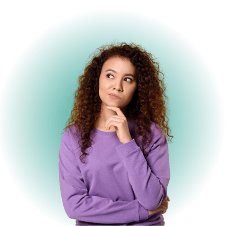 A person deep in thought, with a teal glow behind her.