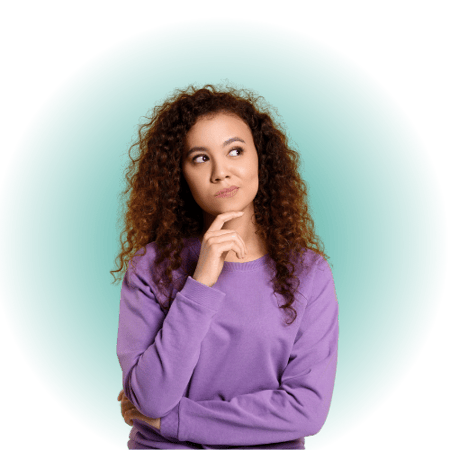 A person deep in thought, with a teal glow behind her.