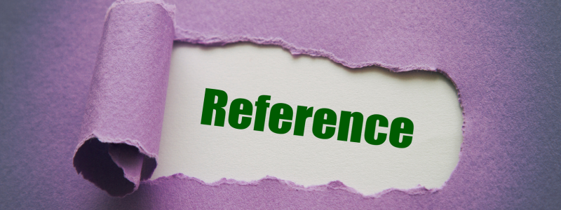 Purple paper with a hole cut out and the word 'reference' showing in the space.
