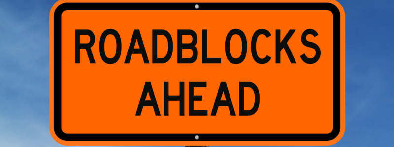 A roadblock sign in orange.